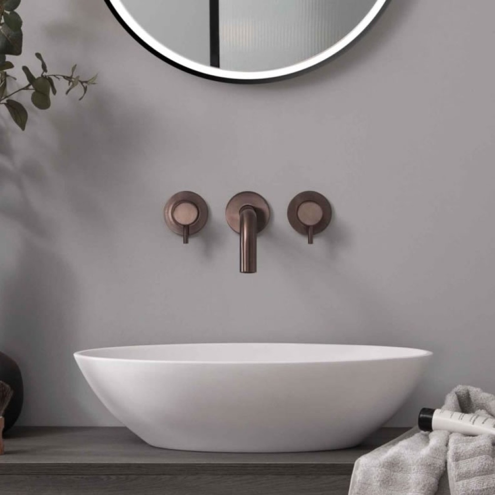 Lifestyle image of JTP Vos Brushed Brass Wall-Mounted Basin Tap